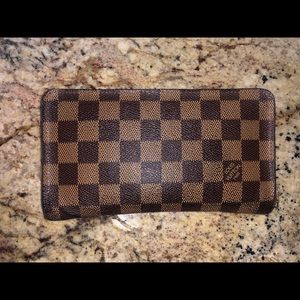 Louis Vuitton wallet ($300 comment for details)